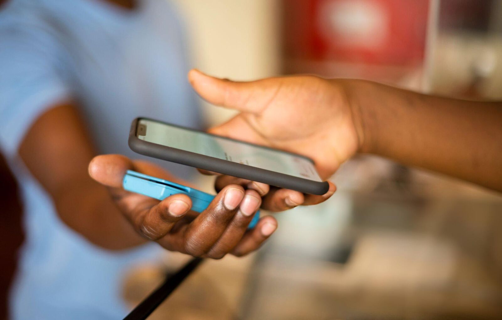 A customer using a phone for a digital payment